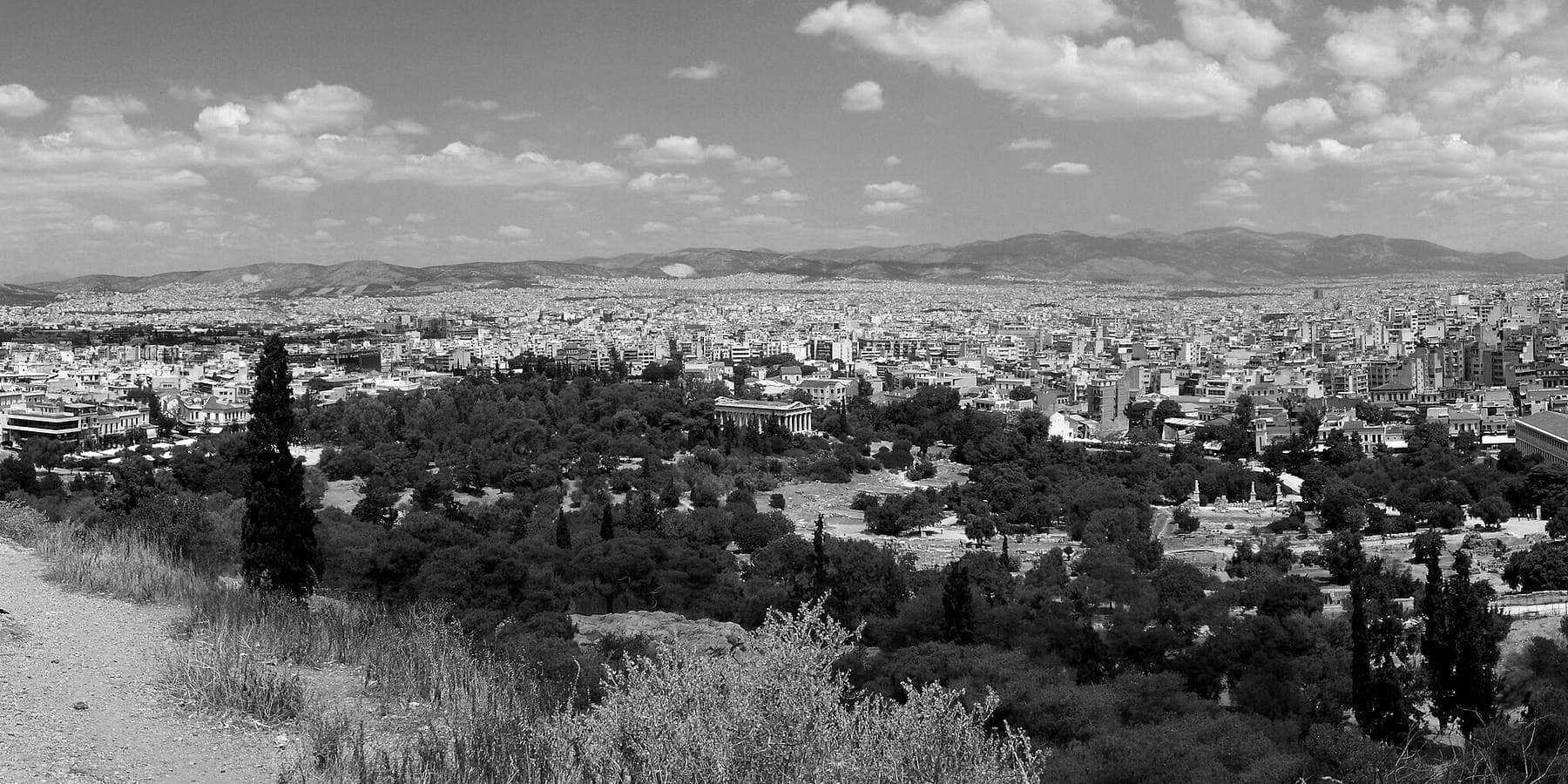 A panoramic view across central Athens toward the surrounding hills.